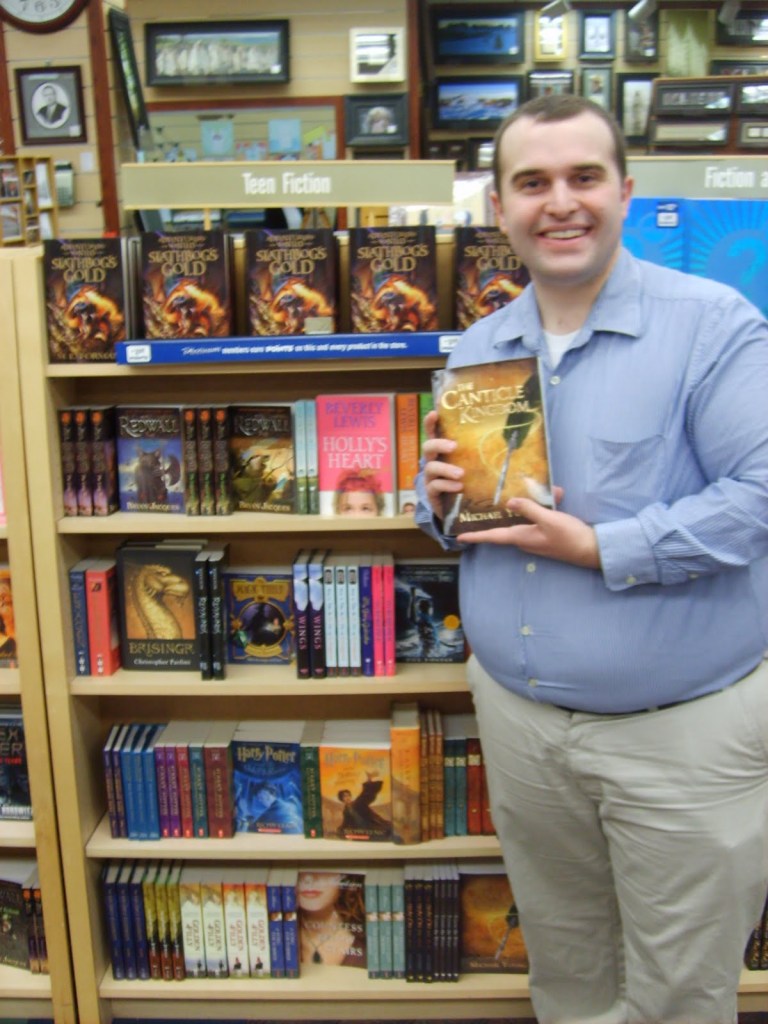 Michael D. Young with the first copy of The Canticle Kingdom he saw on a bookstore shelf
