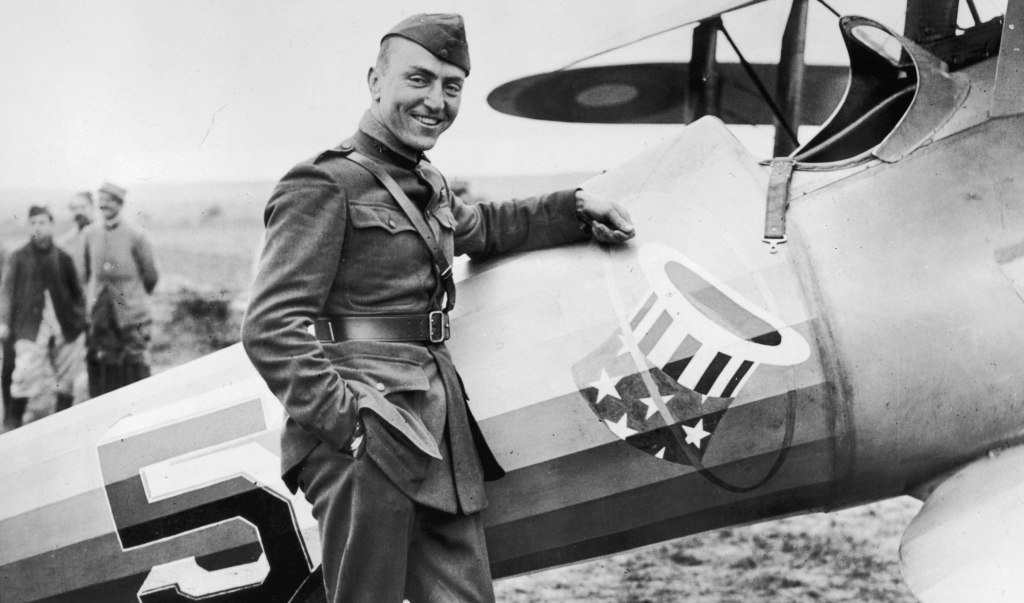 Eddie Rickenbacker standing beside his Nieuport 28 aircraft